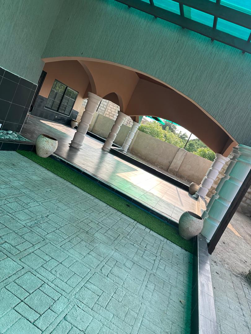 Covered patio walkway connecting client rooms